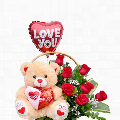 canasta con peluche